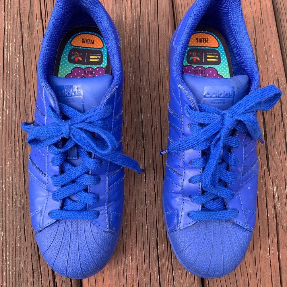Men or women’s blue adidas all star classic athletic shoe
